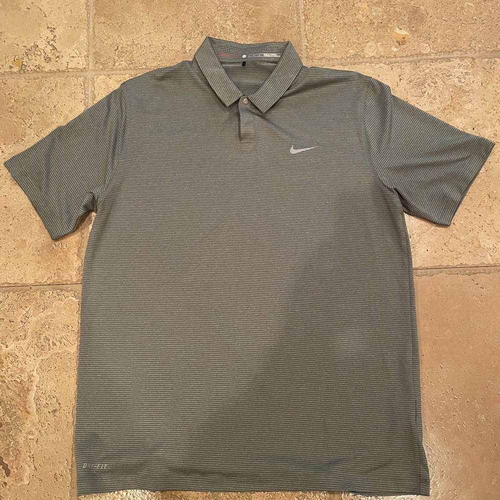 Size L, Tiger Woods collection polo. Worn once. Like-new condition.